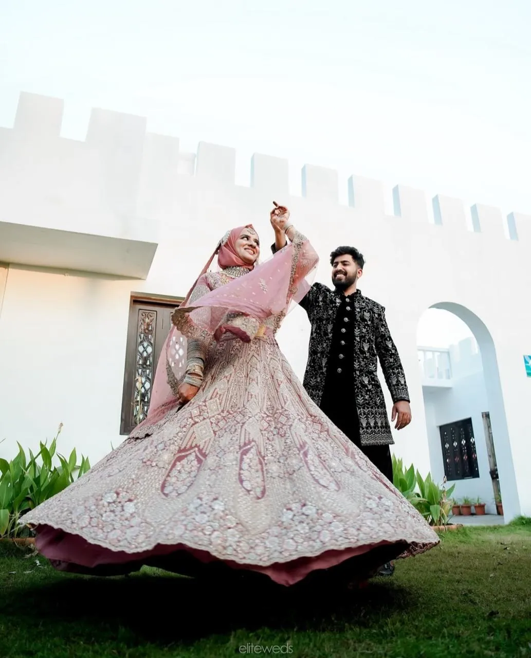 A couple taking photoshoot from outdoor, Clicked by the best wedding photographer in kannur