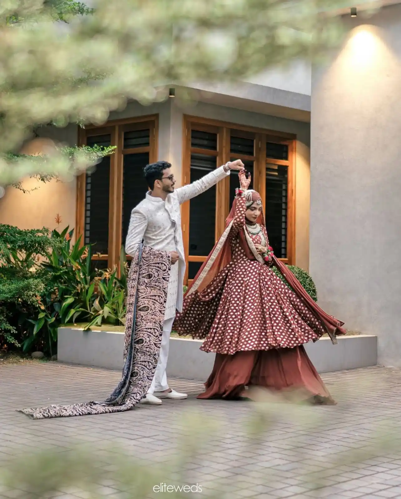 A couple taking wedding photoshoots from outdoor, Clicked by the best wedding photographer in kannur